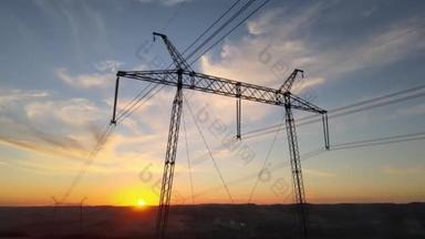 夕阳西下高压电塔.电力传输